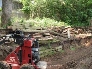 Removal of old timber retaining wall.