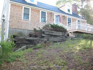 Timber retaining wall demolition and new  construction on Martha's Lane in Harwich.